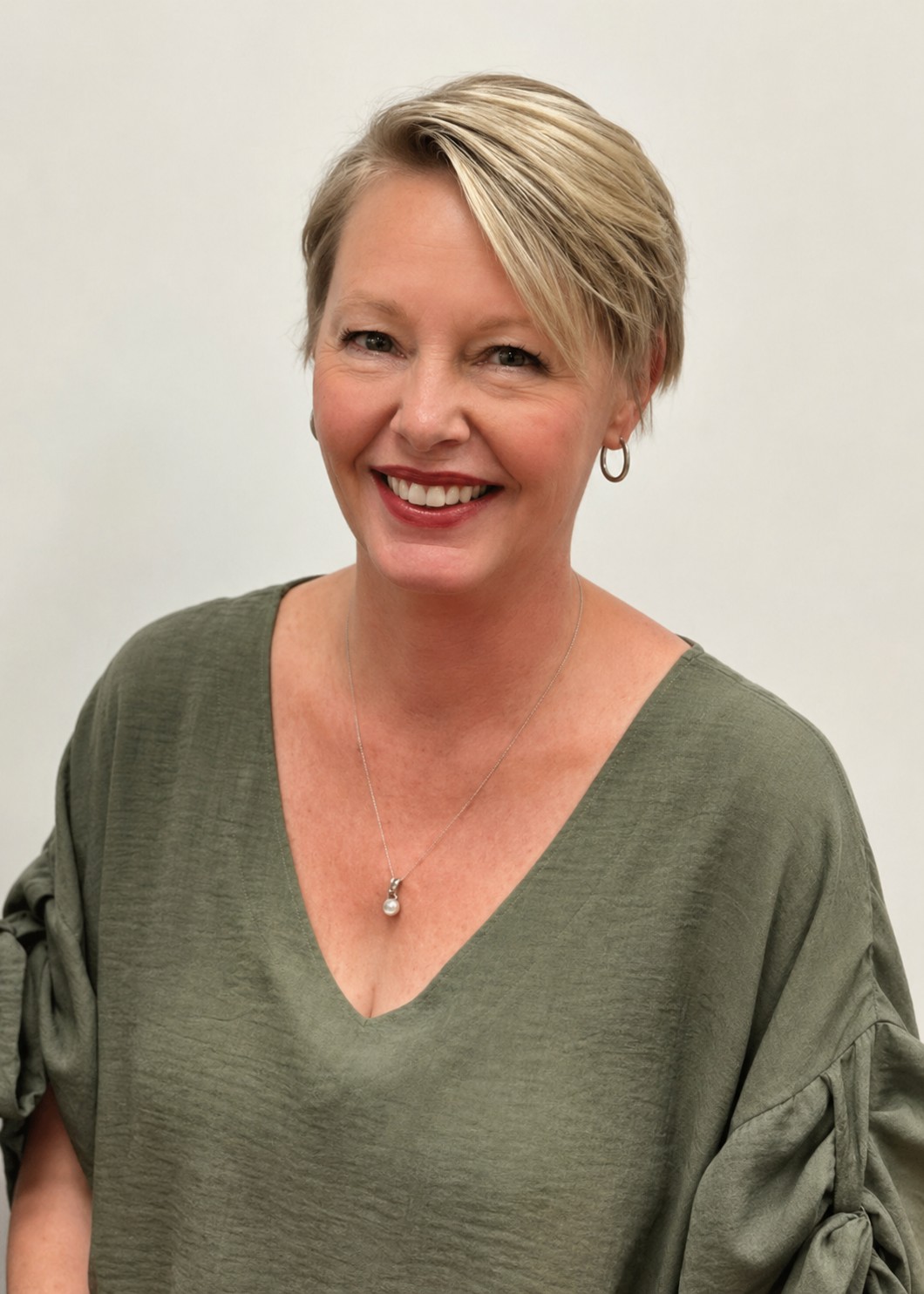 Ami Dustan - Hadinger Flooring